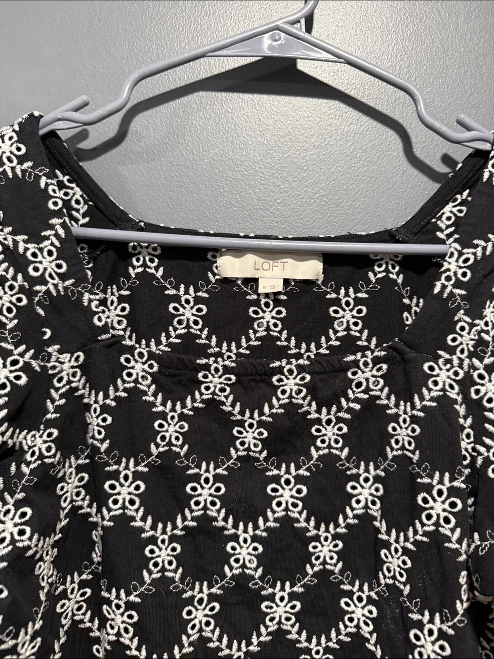 LOFT Black Top with White Floral Lattice Embroidery and Puff Sleeves